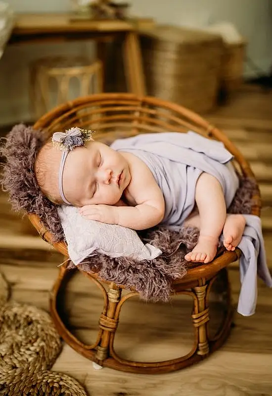 Furniture, Comfort, Chair, Wood, Flash Photography, Happy, Hardwood, Baby, Goggles, Sitting, Child, Toddler, Room, Fashion Accessory, Wood Flooring, Furry friends, Grass, Portrait Photography, Person, Headwear