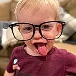 Forehead, Nose, Cheek, Glasses, Skin, Head, Lip, Hairstyle, Facial Expression, Vision Care, Mouth, Eyelash, Ear, Eyewear, Gesture, Happy, Toddler, Fun, Child, Person