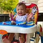 Skin, Smile, Photograph, White, Baby & Toddler Clothing, Happy, Toddler, Red, Leisure, Fun, T-shirt, Recreation, Baby, Child, Electric Blue, Outdoor Furniture, Tree, Shorts, Sitting, Person, Joy