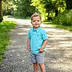 Shorts, Plant, Eyes, People In Nature, Tree, Asphalt, Sunlight, Happy, Grass, T-shirt, Flash Photography, Toddler, Leisure, Morning, Summer, Road, Forest, Road Surface, Electric Blue, Fun, Person, Joy
