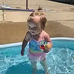 Face, Water, Swimming Pool, Bathing, Happy, Leisure, Aqua, Swimwear, Toddler, Fun, Baby, Recreation, Smile, Child, Games, Nonbuilding Structure, Leisure Centre, Vacation, Play, Grass, Person