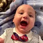 Nose, Cheek, Skin, Head, Lip, Chin, Smile, Mouth, Jaw, Happy, Baby, Gesture, Bow Tie, Collar, Toddler, Baby & Toddler Clothing, Tie, Baby Laughing, Fun, Wrinkle, Person, Headwear