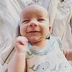 Face, Nose, Cheek, Skin, Head, Smile, Lip, Chin, Eyebrow, Mouth, Comfort, Textile, Happy, Sleeve, Baby & Toddler Clothing, Gesture, Baby, Finger, Cool, Person, Joy