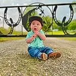 Sky, Cloud, People In Nature, Plant, Baby & Toddler Clothing, Grass, Happy, Flash Photography, Toddler, Baby, Summer, Leisure, People, Child, Fence, Grassland, Landscape, Sitting, Pattern, Fun, Person, Surprise, Headwear