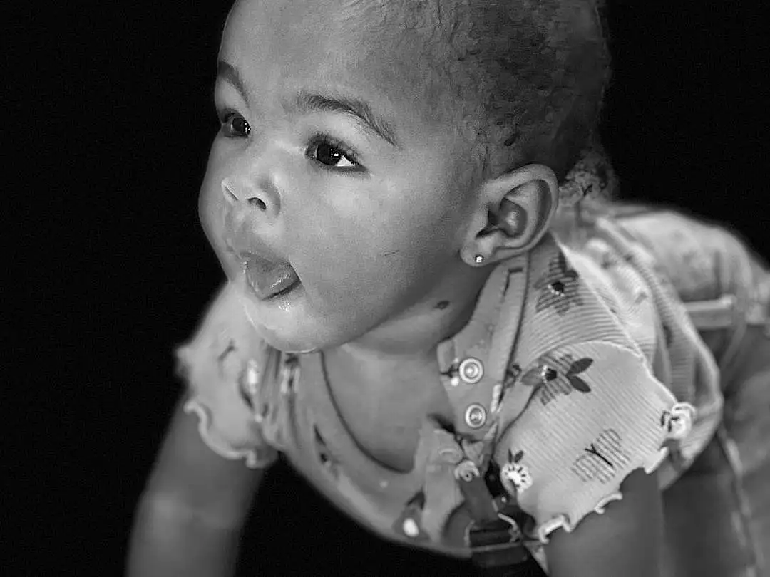 Cheek, Head, Eyes, Flash Photography, Eyelash, Neck, Ear, Sleeve, Style, Black-and-white, Headgear, Happy, Water, Monochrome, Black & White, Beauty, Baby & Toddler Clothing, Jewellery, Toddler, Person