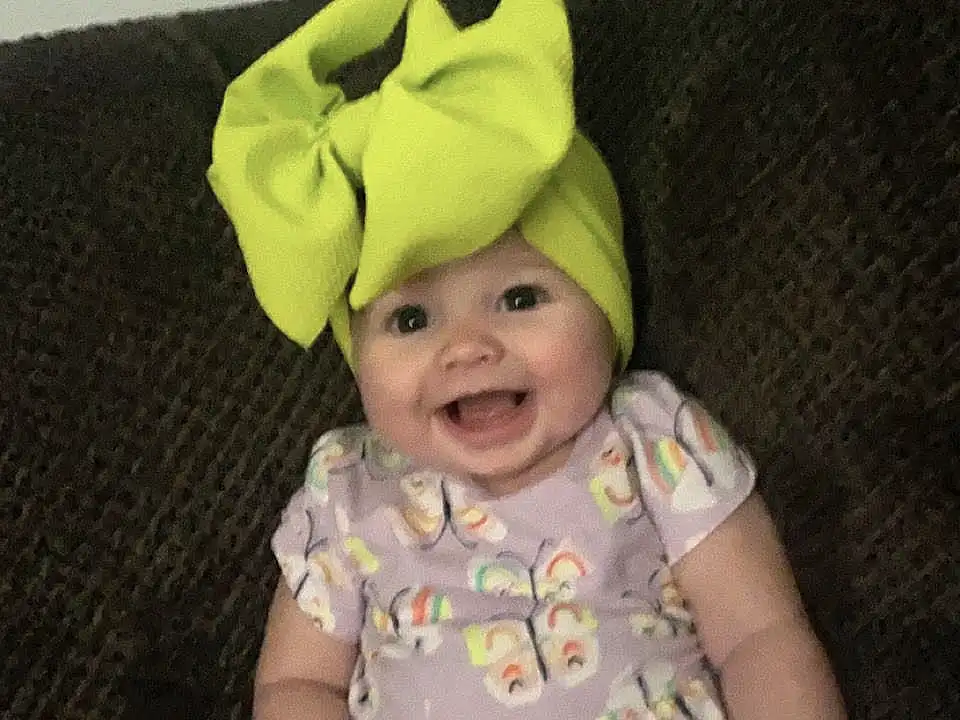 Smile, Baby & Toddler Clothing, Human Body, Sleeve, Baby, Comfort, Headgear, Toddler, Happy, Cap, Child, Couch, T-shirt, Fashion Accessory, Costume Hat, Sitting, Baby Laughing, Fun, Lap, Hat, Person, Headwear