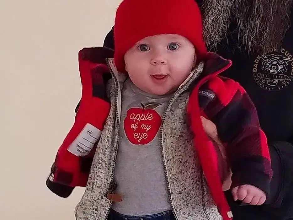 Clothing, Face, Cheek, Outerwear, White, Baby & Toddler Clothing, Sleeve, Pink, Toddler, Headgear, Cap, Jacket, Baby, Pattern, Wood, Child, Knit Cap, Winter, Hood, Wool, Person, Headwear